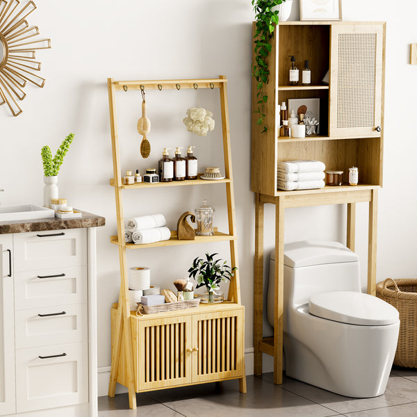 A stylish bathroom featuring bamboo shelving with toiletries, plants, and towels, alongside a modern white toilet and a sink.