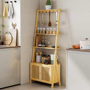 A bamboo kitchen shelf with jars of spices, utensils, and decorative items, complemented by a wood storage cabinet below.