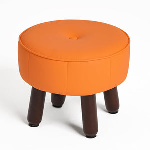 Round orange stool with a tufted top and brown wooden legs, set against a white background.