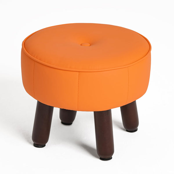 Round orange stool with a tufted top and brown wooden legs, set against a white background.