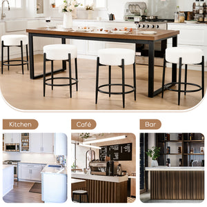 Modern kitchen featuring a wooden table and plush white stools. Includes café and bar settings below for style inspiration.