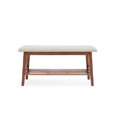 A modern wooden bench with a beige cushioned top and a slatted lower shelf, ideal for seating or storage.